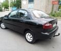 Черный Дэу Ланос, объемом двигателя 1.5 л и пробегом 200 тыс. км за 1999 $, фото 6 на Automoto.ua