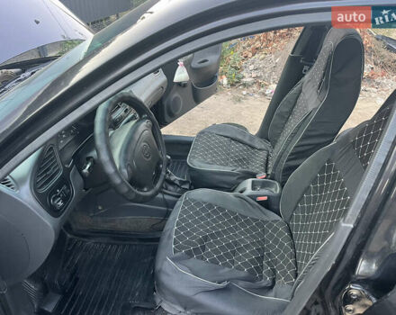 Черный Дэу Ланос, объемом двигателя 1.5 л и пробегом 160 тыс. км за 2800 $, фото 10 на Automoto.ua