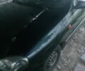 Черный Дэу Ланос, объемом двигателя 1.5 л и пробегом 100 тыс. км за 3000 $, фото 1 на Automoto.ua