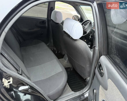 Черный Дэу Ланос, объемом двигателя 1.5 л и пробегом 251 тыс. км за 2550 $, фото 6 на Automoto.ua