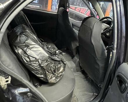 Черный Дэу Ланос, объемом двигателя 1.5 л и пробегом 145 тыс. км за 1799 $, фото 8 на Automoto.ua
