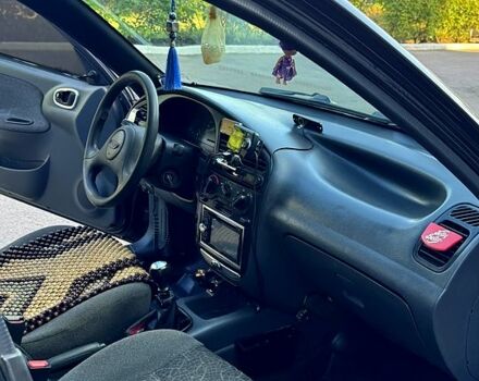 Чорний Деу Ланос, об'ємом двигуна 1.5 л та пробігом 0 тис. км за 2000 $, фото 6 на Automoto.ua