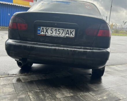 Чорний Деу Ланос, об'ємом двигуна 1.5 л та пробігом 213 тис. км за 1700 $, фото 4 на Automoto.ua