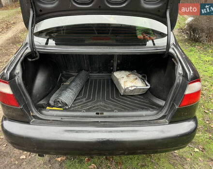 Черный Дэу Ланос, объемом двигателя 1.5 л и пробегом 140 тыс. км за 2500 $, фото 11 на Automoto.ua