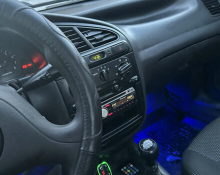 Черный Дэу Ланос, объемом двигателя 1.5 л и пробегом 270 тыс. км за 1900 $, фото 11 на Automoto.ua