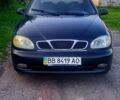Черный Дэу Ланос, объемом двигателя 1.5 л и пробегом 130 тыс. км за 2100 $, фото 1 на Automoto.ua