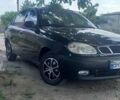 Чорний Деу Ланос, об'ємом двигуна 1.5 л та пробігом 328 тис. км за 2700 $, фото 1 на Automoto.ua