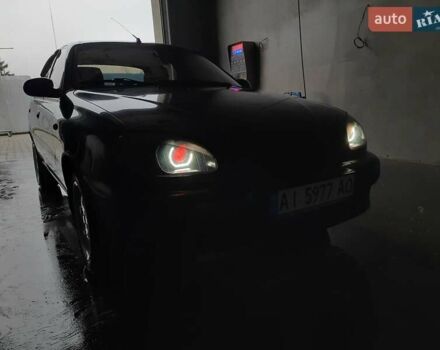 Черный Дэу Ланос, объемом двигателя 1.5 л и пробегом 208 тыс. км за 3000 $, фото 2 на Automoto.ua