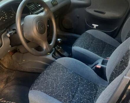 Черный Дэу Ланос, объемом двигателя 1.5 л и пробегом 110 тыс. км за 1500 $, фото 2 на Automoto.ua