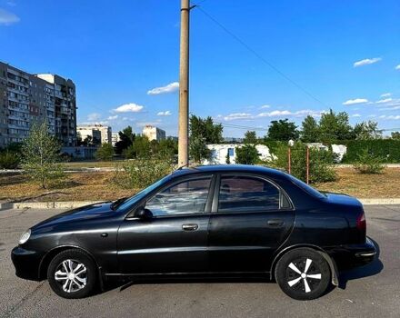 Черный Дэу Ланос, объемом двигателя 1.5 л и пробегом 310 тыс. км за 2500 $, фото 2 на Automoto.ua