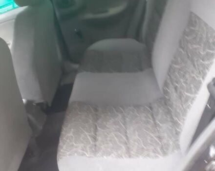 Черный Дэу Ланос, объемом двигателя 1.5 л и пробегом 94 тыс. км за 2800 $, фото 6 на Automoto.ua