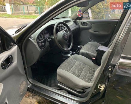 Черный Дэу Ланос, объемом двигателя 1.5 л и пробегом 263 тыс. км за 1830 $, фото 5 на Automoto.ua