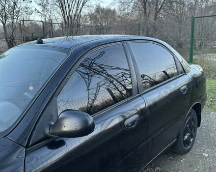 Черный Дэу Ланос, объемом двигателя 1.5 л и пробегом 270 тыс. км за 1900 $, фото 8 на Automoto.ua