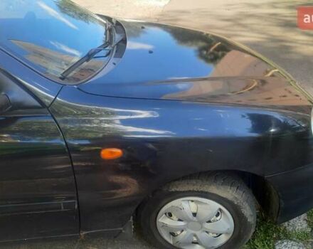 Черный Дэу Ланос, объемом двигателя 1.5 л и пробегом 110 тыс. км за 1500 $, фото 11 на Automoto.ua