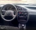 Черный Дэу Ланос, объемом двигателя 1.5 л и пробегом 216 тыс. км за 2700 $, фото 9 на Automoto.ua