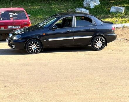 Чорний Деу Ланос, об'ємом двигуна 1.5 л та пробігом 0 тис. км за 2000 $, фото 5 на Automoto.ua
