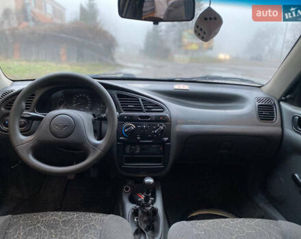 Черный Дэу Ланос, объемом двигателя 1.5 л и пробегом 231 тыс. км за 1750 $, фото 7 на Automoto.ua