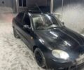 Черный Дэу Ланос, объемом двигателя 1.5 л и пробегом 356 тыс. км за 2000 $, фото 1 на Automoto.ua