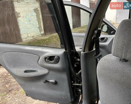 Черный Дэу Ланос, объемом двигателя 1.5 л и пробегом 140 тыс. км за 2500 $, фото 24 на Automoto.ua