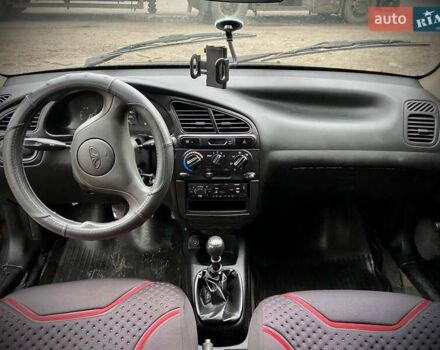 Черный Дэу Ланос, объемом двигателя 0 л и пробегом 201 тыс. км за 1500 $, фото 5 на Automoto.ua