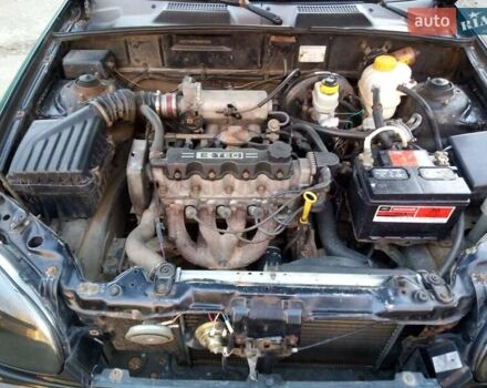 Черный Дэу Ланос, объемом двигателя 1.5 л и пробегом 231 тыс. км за 1999 $, фото 14 на Automoto.ua
