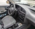 Черный Дэу Ланос, объемом двигателя 1.5 л и пробегом 377 тыс. км за 1200 $, фото 1 на Automoto.ua