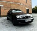 Черный Дэу Ланос, объемом двигателя 1.5 л и пробегом 280 тыс. км за 1450 $, фото 1 на Automoto.ua
