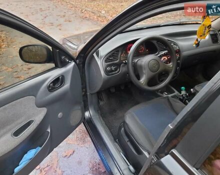 Черный Дэу Ланос, объемом двигателя 1.5 л и пробегом 208 тыс. км за 3000 $, фото 8 на Automoto.ua