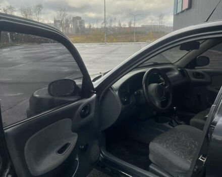 Чорний Деу Ланос, об'ємом двигуна 1.5 л та пробігом 213 тис. км за 1700 $, фото 7 на Automoto.ua