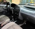 Черный Дэу Ланос, объемом двигателя 1.5 л и пробегом 280 тыс. км за 1450 $, фото 5 на Automoto.ua