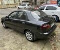 Чорний Деу Ланос, об'ємом двигуна 1.5 л та пробігом 222 тис. км за 1800 $, фото 4 на Automoto.ua