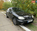 Черный Дэу Ланос, объемом двигателя 1.5 л и пробегом 263 тыс. км за 1830 $, фото 1 на Automoto.ua