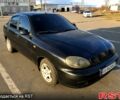 Черный Дэу Ланос, объемом двигателя 1.5 л и пробегом 130 тыс. км за 2500 $, фото 1 на Automoto.ua