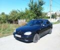 Чорний Деу Ланос, об'ємом двигуна 1.5 л та пробігом 210 тис. км за 1100 $, фото 1 на Automoto.ua