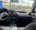 Чорний Деу Ланос, об'ємом двигуна 1.5 л та пробігом 213 тис. км за 1800 $, фото 4 на Automoto.ua