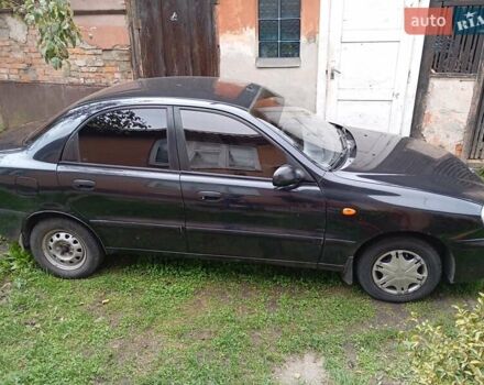 Черный Дэу Ланос, объемом двигателя 1.5 л и пробегом 272 тыс. км за 2000 $, фото 2 на Automoto.ua