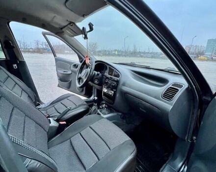 Черный Дэу Ланос, объемом двигателя 1.5 л и пробегом 653 тыс. км за 2199 $, фото 10 на Automoto.ua