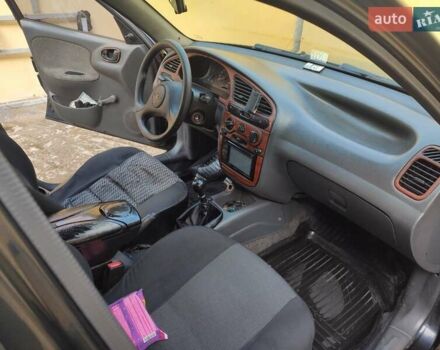 Дэу Ланос 2006 в Кривом Роге на Automoto.ua Черный Дэу Ланос, объемом двигателя 1.5 л и пробегом 273 тыс. км за 3000 $, фото 7 на Automoto.ua