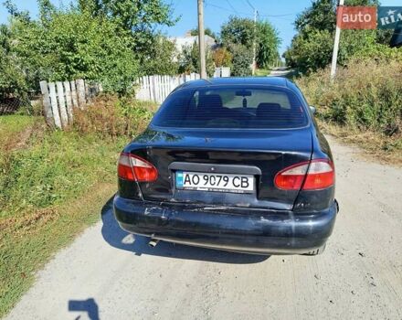Чорний Деу Ланос, об'ємом двигуна 1.5 л та пробігом 210 тис. км за 1100 $, фото 6 на Automoto.ua