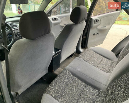 Черный Дэу Ланос, объемом двигателя 1.5 л и пробегом 263 тыс. км за 1830 $, фото 8 на Automoto.ua