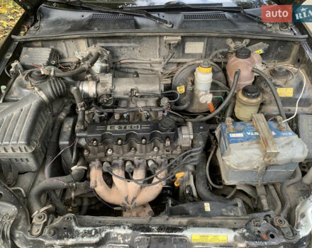 Черный Дэу Ланос, объемом двигателя 1.5 л и пробегом 290 тыс. км за 1600 $, фото 7 на Automoto.ua