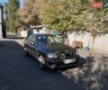 Черный Дэу Ланос, объемом двигателя 1.6 л и пробегом 186 тыс. км за 2300 $, фото 1 на Automoto.ua