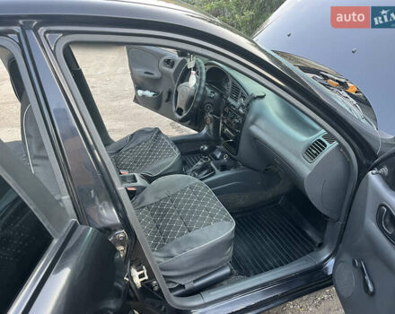 Черный Дэу Ланос, объемом двигателя 1.5 л и пробегом 160 тыс. км за 2800 $, фото 13 на Automoto.ua