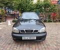 Черный Дэу Ланос, объемом двигателя 1.5 л и пробегом 234 тыс. км за 2500 $, фото 1 на Automoto.ua