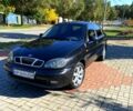Черный Дэу Ланос, объемом двигателя 1.5 л и пробегом 230 тыс. км за 3100 $, фото 1 на Automoto.ua