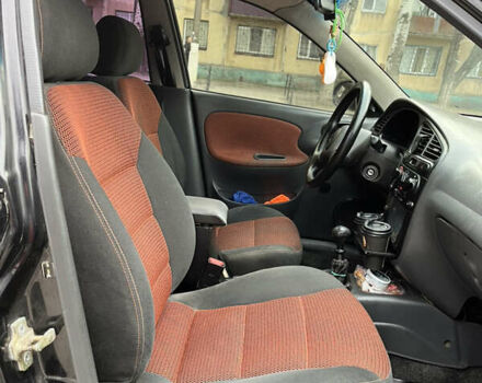 Черный Дэу Ланос, объемом двигателя 1.5 л и пробегом 222 тыс. км за 2400 $, фото 22 на Automoto.ua