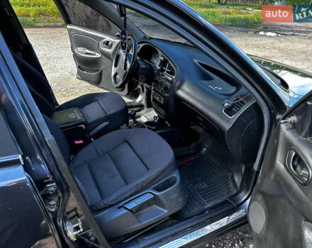 Черный Дэу Ланос, объемом двигателя 1.5 л и пробегом 220 тыс. км за 3100 $, фото 10 на Automoto.ua