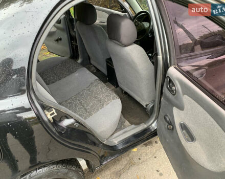 Черный Дэу Ланос, объемом двигателя 1.5 л и пробегом 263 тыс. км за 1830 $, фото 7 на Automoto.ua