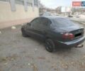 Черный Дэу Ланос, объемом двигателя 1.5 л и пробегом 200 тыс. км за 1550 $, фото 2 на Automoto.ua