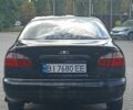 Чорний Деу Ланос, об'ємом двигуна 1.5 л та пробігом 175 тис. км за 2300 $, фото 3 на Automoto.ua
